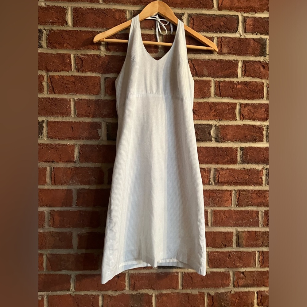 Light blue and white gingham short sundress that ties at neck w/ back zipper.